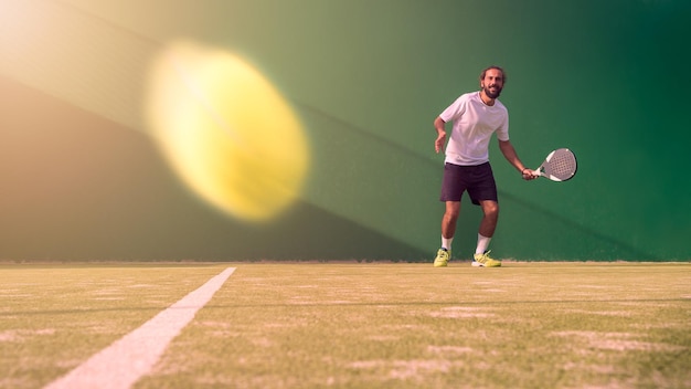 Acticing paddle sport on the outdoor court Man teaching padel class