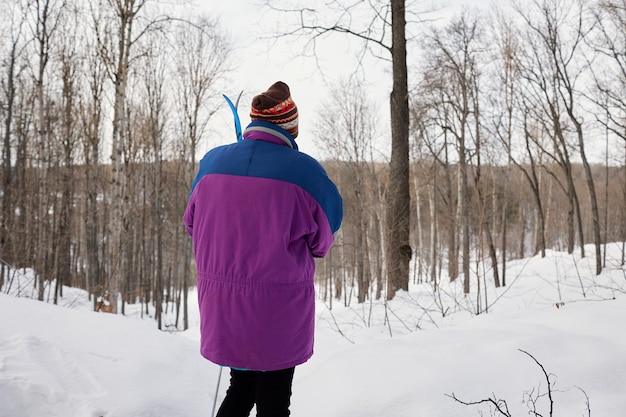 An active elderly couple is engaged in skiing