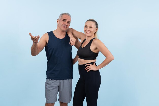 Photo active and fit physique senior people portrait with happy smile on isolated background healthy lifelong senior couple with fitness healthy and sporty body care lifestyle concept clout