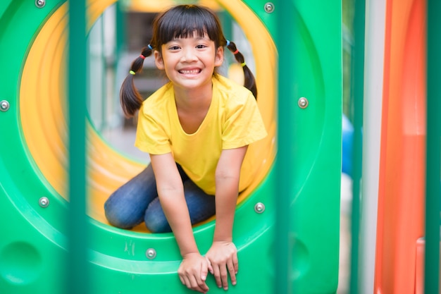 Active little girl on playground