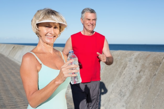 Active senior couple out for a jog