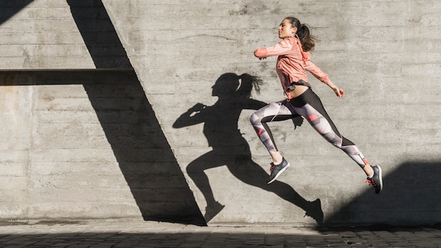 Active young woman training outdoor