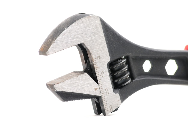 Adjustable wrench for plumbers and gas fitters on an isolated white
