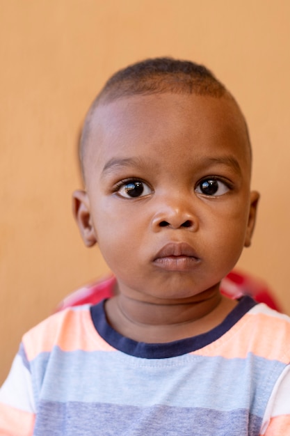 Adorable african black little boy