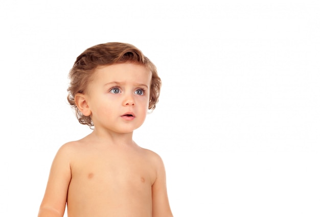 Adorable baby with blue eyes looking up