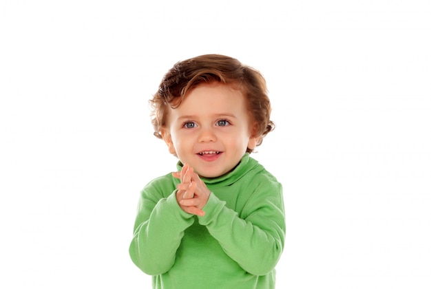 Adorable baby with green shirt  