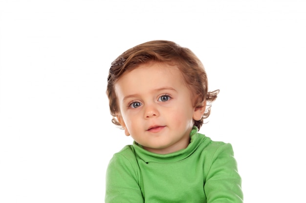 Adorable baby with green shirt  