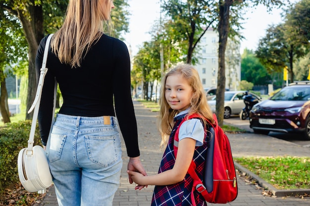 Adorable cute little girl feeling excited about going back from school