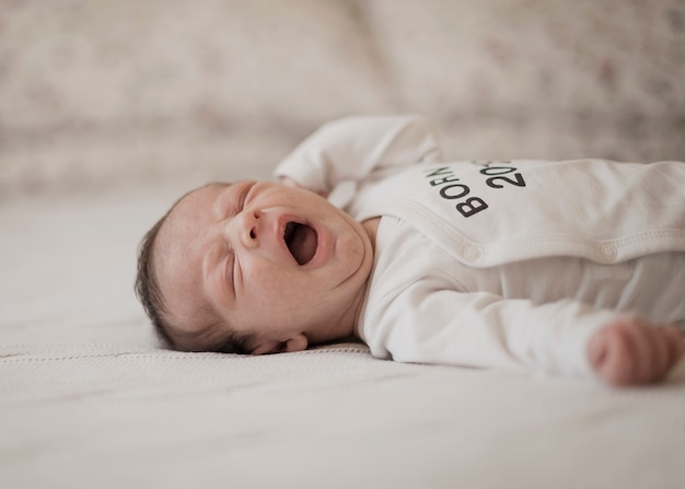 Adorable little baby yawning