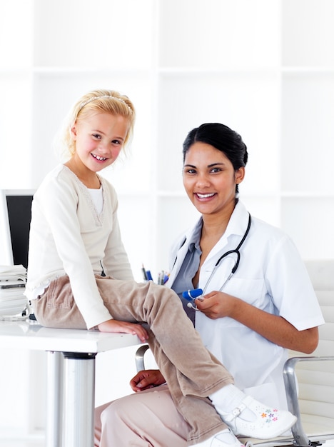 Adorable little girl attending a medical check-up