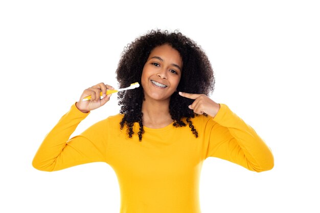 Adorable teenage doing gestures isolated on a white wall