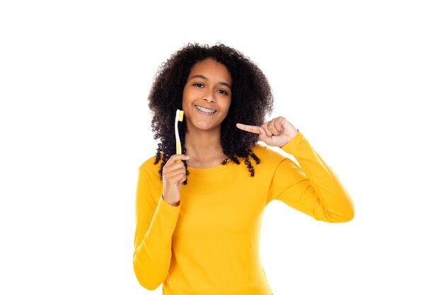 Adorable teenage doing gestures isolated on a white wall