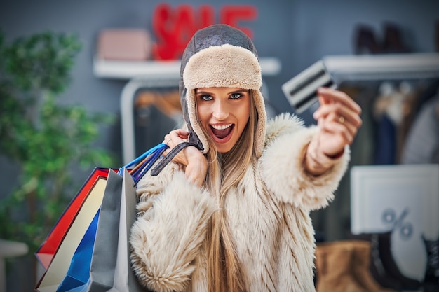 adult woman shopping for clothes in boutique