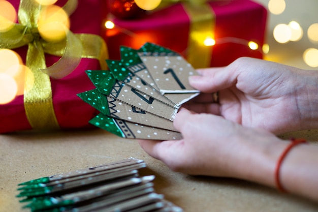 Advent calendar close up, selective focus. Family fun and Christmas traditions. Christmas and New Year atmosphere concept