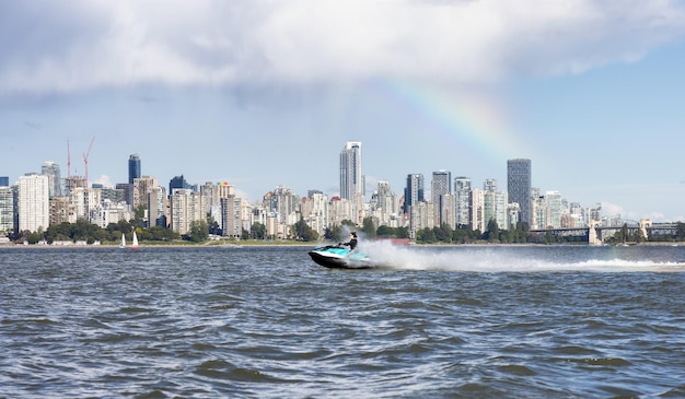 Adventurous caucasian woman on seadoo riding in the ocean