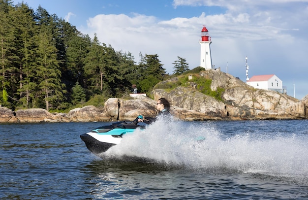 Adventurous caucasian woman on seadoo riding in the ocean