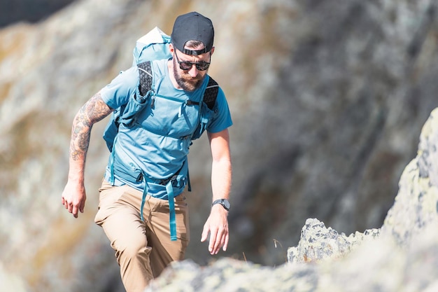 Adventurous man during an alpine trek