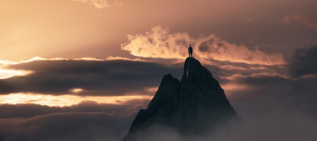 Adventurous Man Hiker Standing on top of a rocky mountain