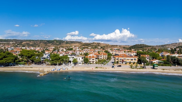 Aegean sea coast of Greece, view of Nikiti from the drone, multiple buildings