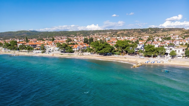 Aegean sea coast of Greece, view of Nikiti from the drone, multiple buildings