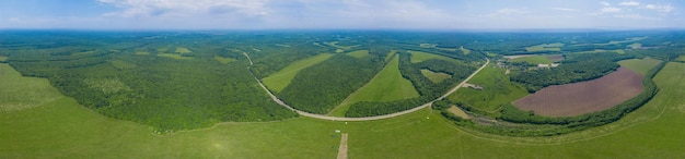 Aerial caucasus forest panoramic background green fields