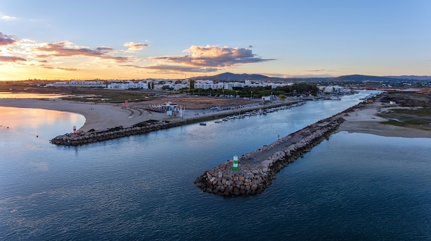 Aerial. Delightful sunset over the Portuguese village Fuzeta, Tavira.