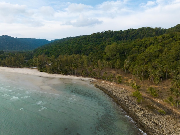 Aerial drone view of beautiful beach with turquoise sea water and palm trees of Gulf of Thailand Kood island Thailand