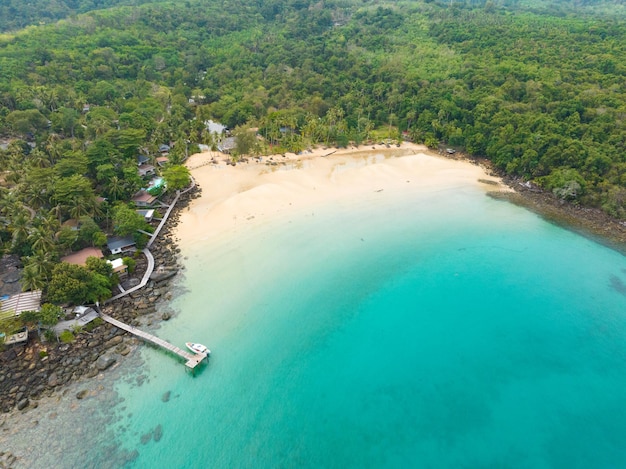 Aerial drone view of beautiful beach with turquoise sea water and palm trees of Gulf of Thailand Kood island Thailand