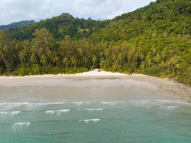 Aerial drone view of beautiful beach with turquoise sea water and palm trees of Gulf of Thailand Kood island Thailand