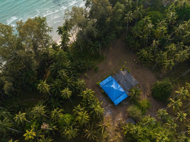 Aerial drone view of beautiful beach with turquoise sea water and palm trees of Gulf of Thailand Kood island Thailand