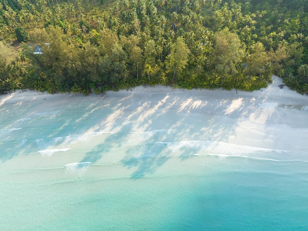 Aerial drone view of beautiful beach with turquoise sea water and palm trees of Gulf of Thailand Kood island Thailand