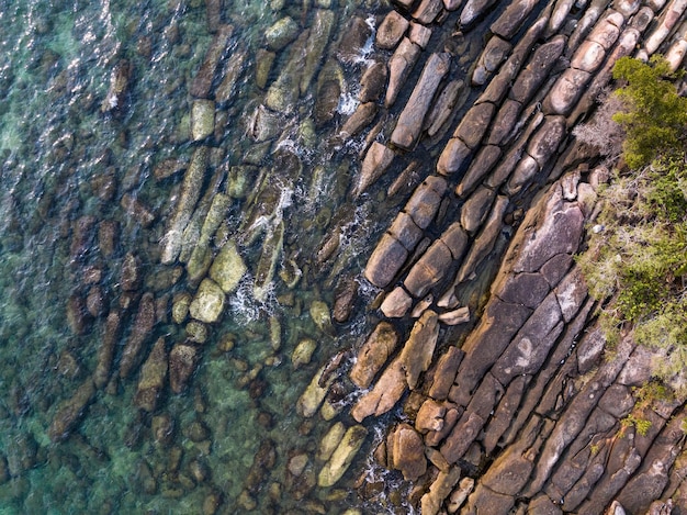 Aerial drone view of beautiful rocky with turquoise sea water of Gulf of Thailand