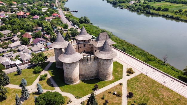 Aerial drone view of Soroca Fort in Moldova. Park, residential buildings and river near it