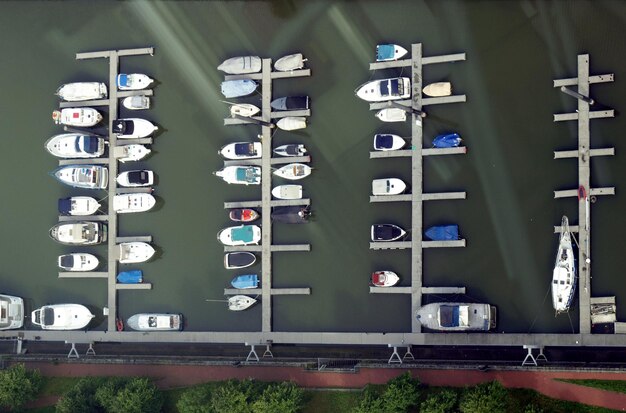 Aerial flat lay view of boats in harbour