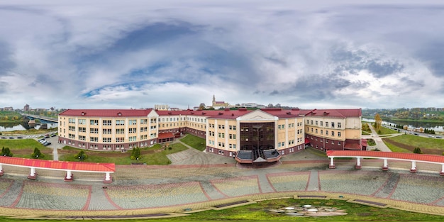 Aerial full seamless spherical hdri 360 panorama view above over a medieval castle with columns and historic buildings in equirectangular projection