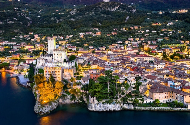 Aerial night view of Scaliger Castle in Malcesine - Lake Garda, Northern Italy