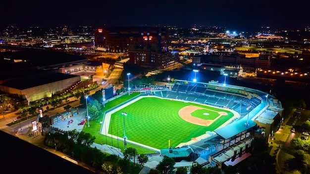 Aerial Nighttime Baseball Stadium and Cityscape