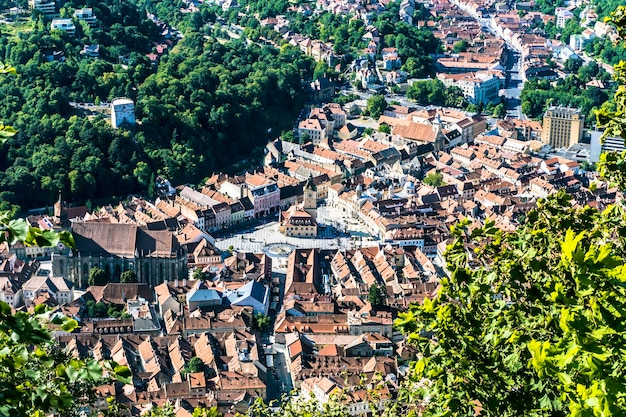 Aerial panorama view over the historical Old Town in the city of Brasov with Tampa mountain