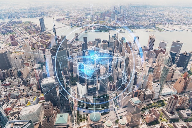 Aerial panoramic helicopter city view on Lower Manhattan district and financial Downtown New York USA Technologies and education concept Academic research top ranking university hologram