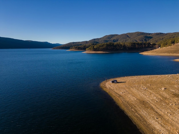 Aerial panoramic view of Dospat Reservoir located in Bulgaria Rhodopa Mountains