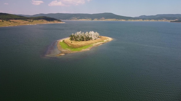 Aerial panoramic view of Island on a Batak Reservoir located in Bulgaria Rhodopa Mountains