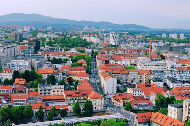 Aerial panoramic view of Ljubljana, capital of Slovenia in warm sunset light. Travel destination