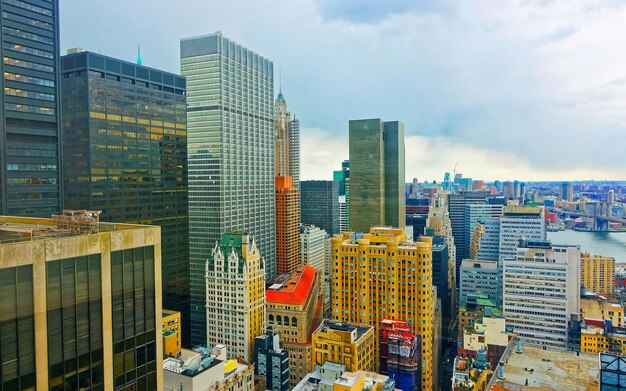 Aerial panoramic view on Lower Manhattan skyscrapers in New York, USA. Skyline. American architecture building exteriors. Panorama of Metropolis center NYC. Metropolitan cityscape.