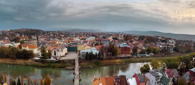 Aerial panoramic view part of european city of uzhgorod near the uzh river which is located in trans