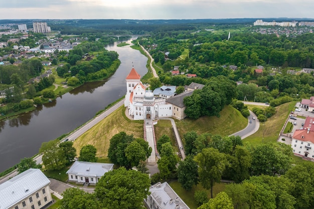 Aerial panoramic view promenade overlooking the old city and historic buildings of medieval castle near wide river