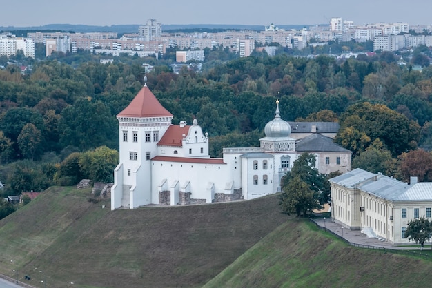 Aerial panoramic view promenade overlooking the old city and historic buildings of medieval castle near wide river