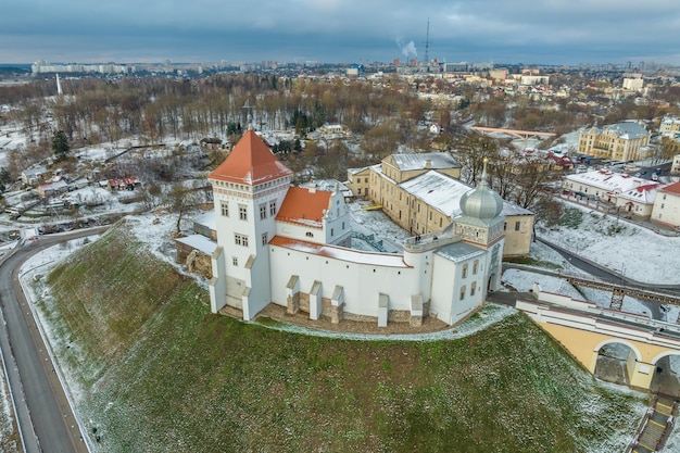 Aerial panoramic view promenade overlooking the old city and historic buildings of medieval castle near wide river