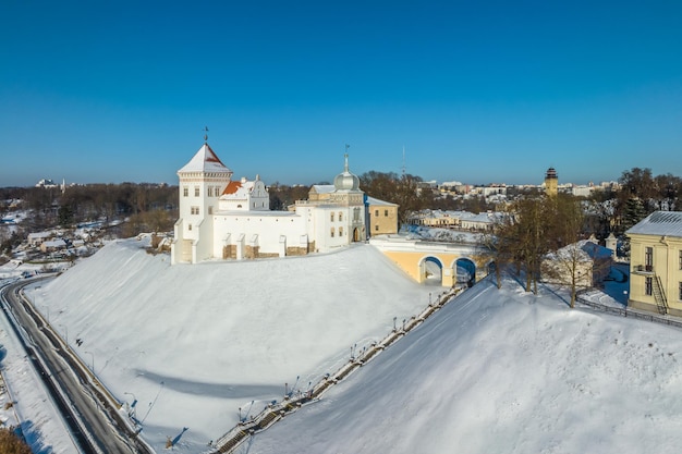 Aerial panoramic view promenade overlooking the old city and historic buildings of medieval castle near wide river