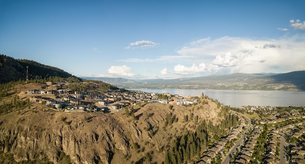 Aerial panoramic view of residential homes on top of a mountain