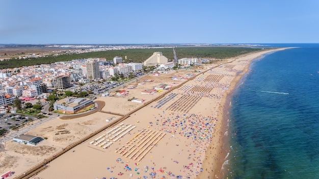 Aerial. Photo from sky of the Monte Gordo beaches, shot from the drone. Portugal, Algarve